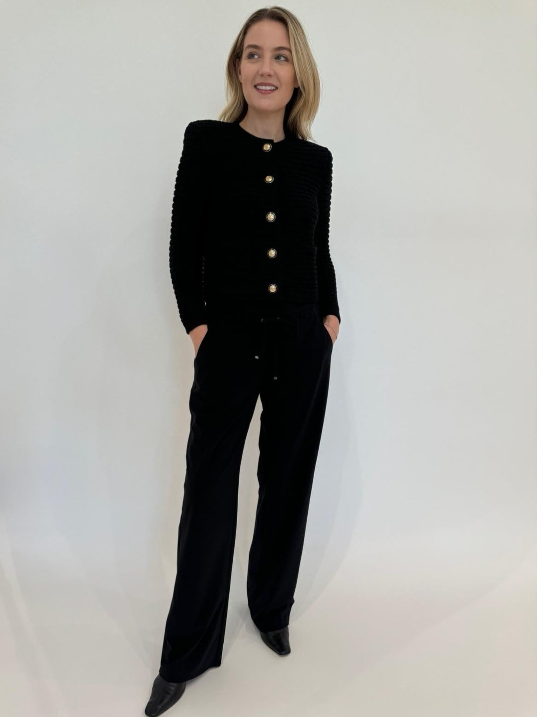 Ba&sh Gaspard Knit Cardigan in Noir paired with Raffaello Rossi Candice Straight Pants in Black available at Barbara Katz