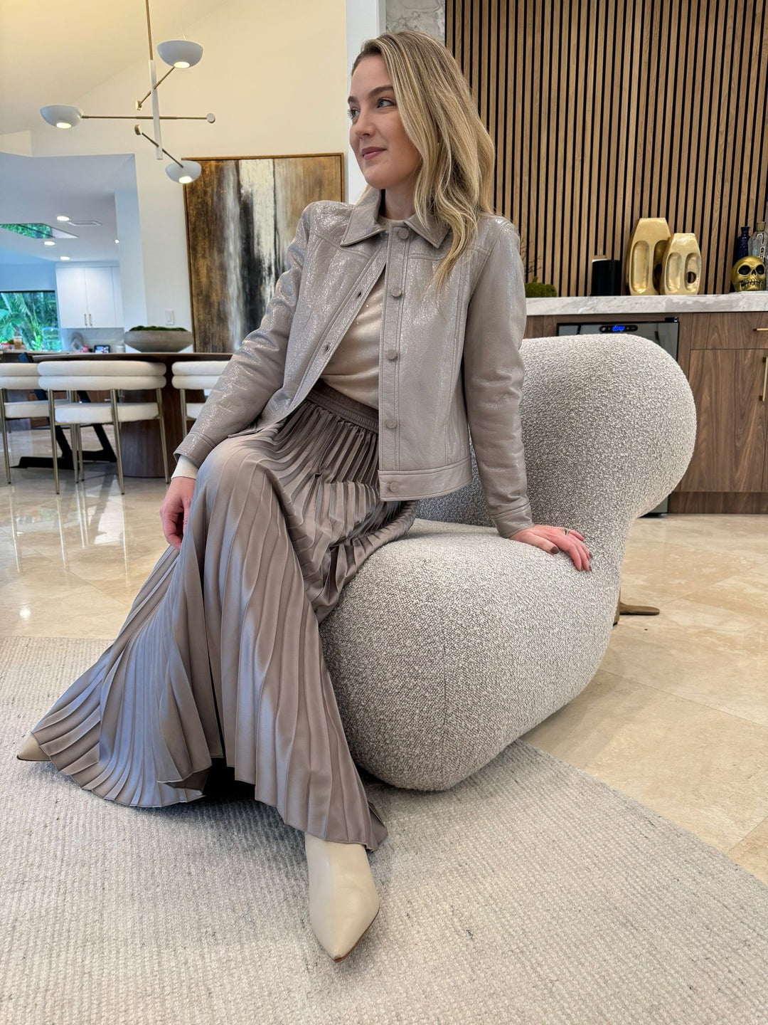 Marella Monochrome Turtledove Leggio Jacket with Generation Love Elsie Crystal Sweater in Beige underneath, paired with Agente Pleated Skirt in Turtledove - all available at Barbara Katz