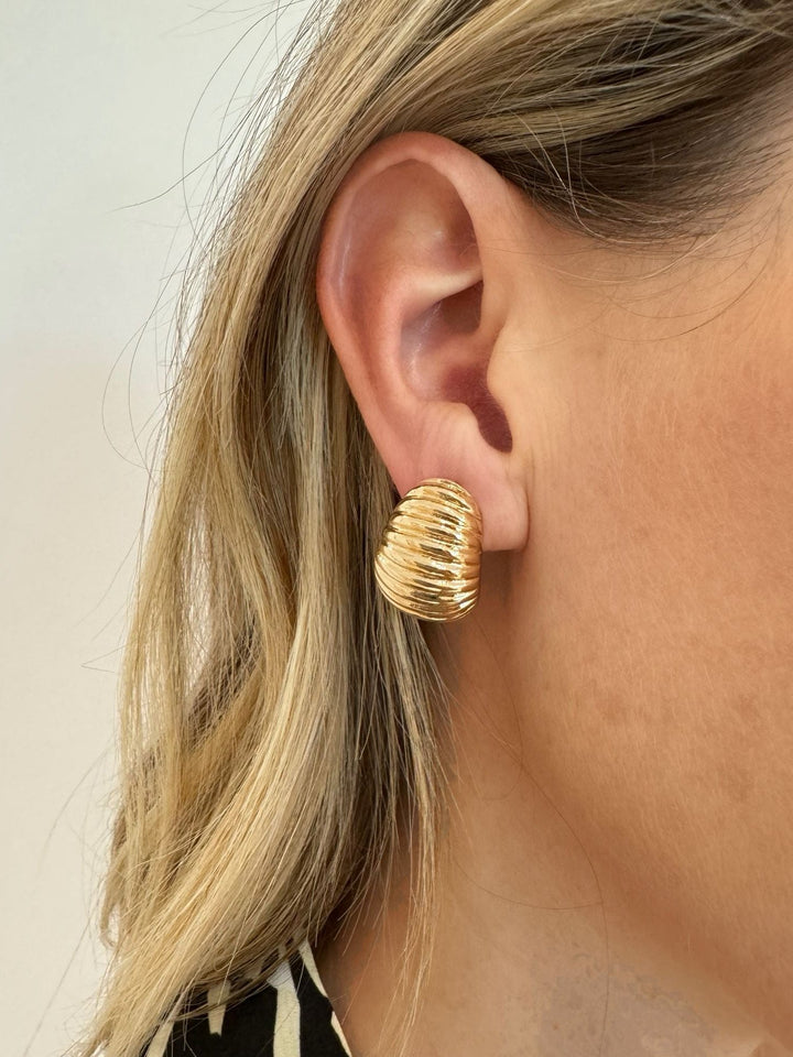 BK Jewelry Lori Ribbed Oval Dome Shape Clip Earrings in Gold available at Barbara Katz