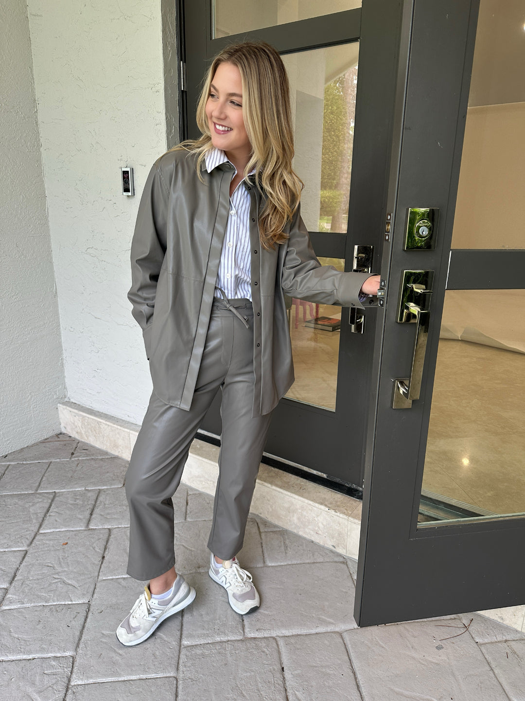 Marella Viterbo Cropped Shirt in Grey layered with Volto Jersey Jacket and paired with Selva Jersey Trousers, all available at Barbara Katz