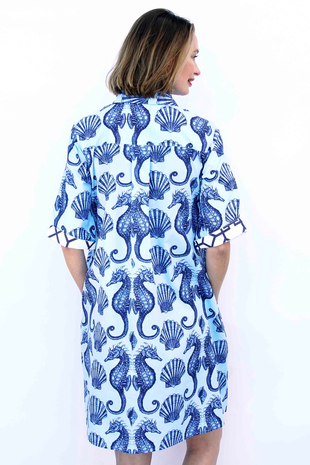 Dizzy-Lizzie Monterey Dress - Ocean Blue Ground With Seahorses available at Barbara Katz