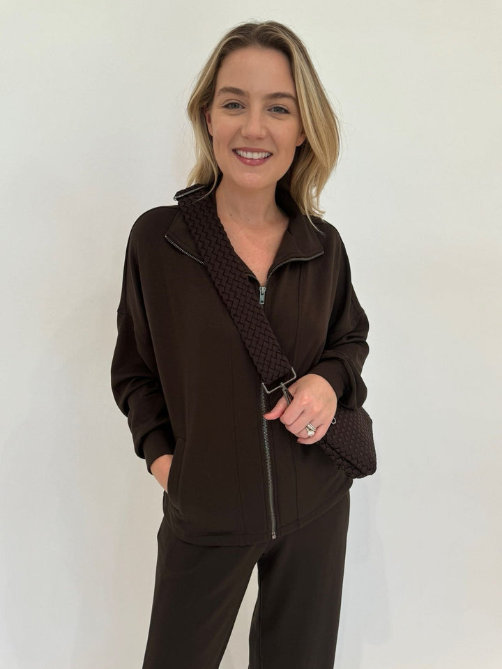 BK Lola Zip-Up Jacket in Chocolate Brown paired with matching Cindy High-Waist Wide Leg Sweatpants, Sol and Selene Ethereal Woven Neoprene Bag in Chocolate available at Barbara Katz