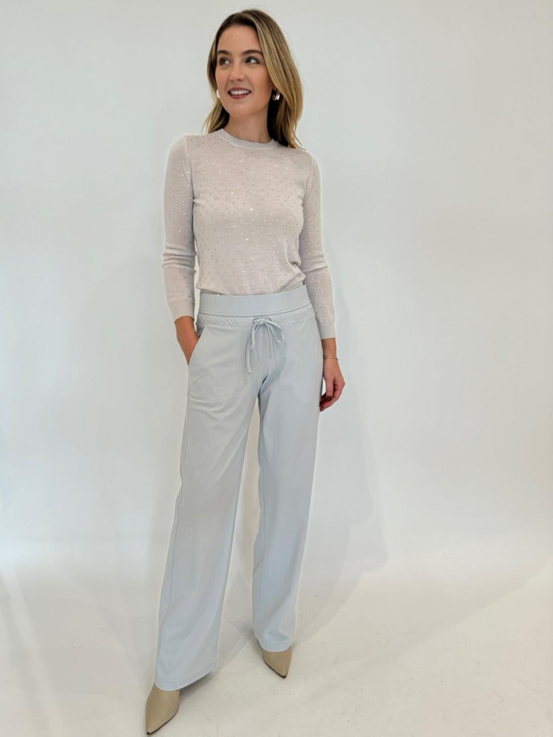 Marella Monochrome Elce Rhinestone Pullover Sweater in Wool White paired with Raffaello Rossi Candice Straight Pants in Light Grey available at Barbara Katz