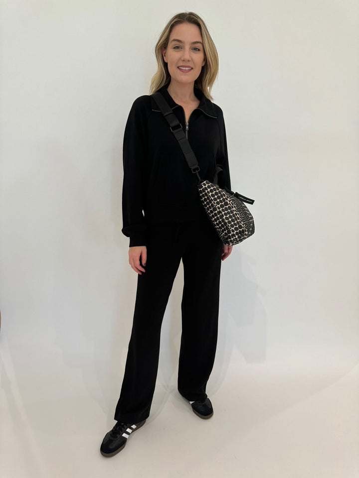 BK Caroline Half Zip-Up Collar Sweatshirt in Black paired with matching Cindy High-Waist Wide Leg Sweatpants, Daniella Lehavi Tokyo Small Shopper Bag in Cream available at Barbara Katz