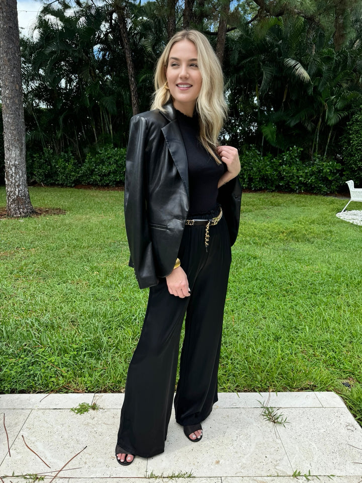 Melissa Nepton Helero Satin Top in Off White paired with BK Sophie Italian Silky Viscose Palazzo Pants in Black available at Barbara Katz