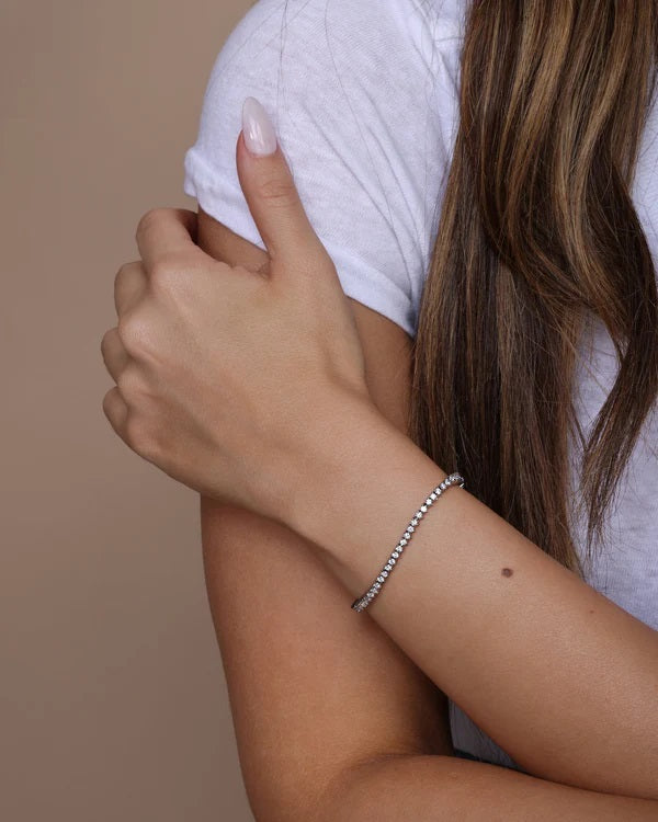 Melinda Maria Baby Not Your Basic Tennis Bracelet in Silver White available at Barbara Katz