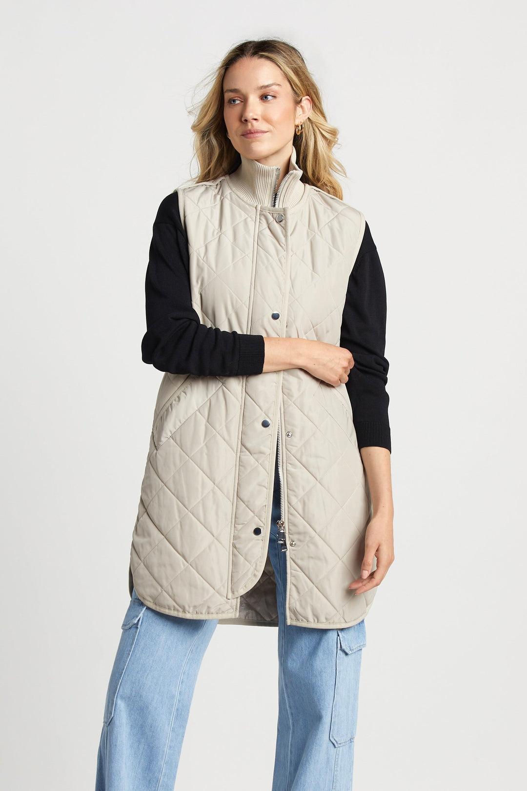 Adroit Atelier Destiny Sleeveless Quilted Vest With Side Zipper Detail in Birch available at Barbara Katz