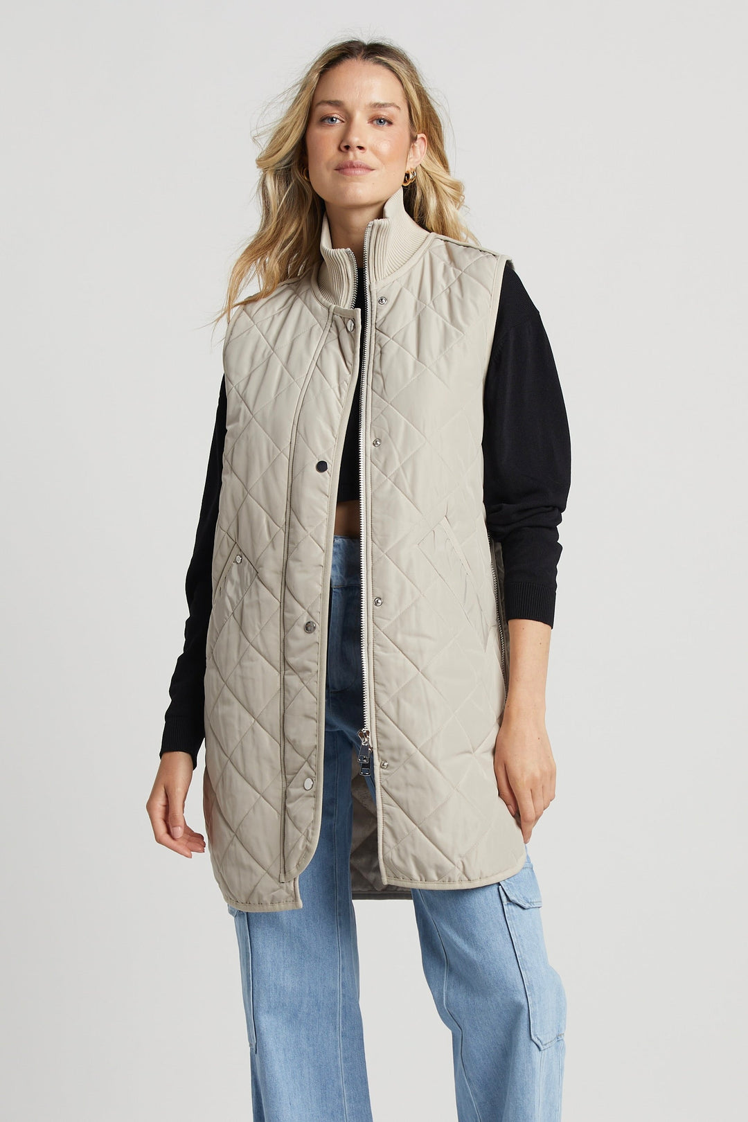 Adroit Atelier Destiny Sleeveless Quilted Vest With Side Zipper Detail in Birch available at Barbara Katz