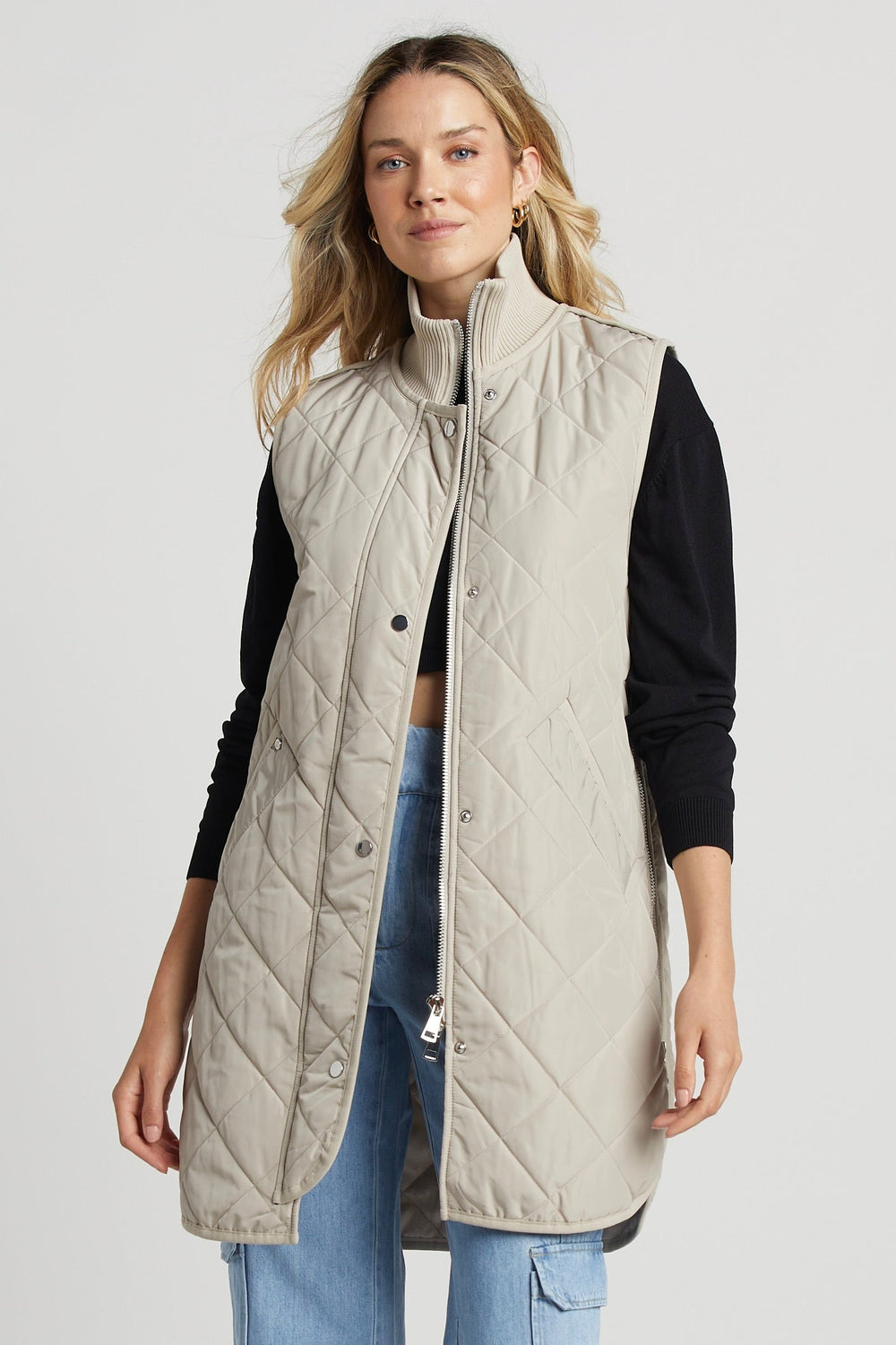 Adroit Atelier Destiny Sleeveless Quilted Vest With Side Zipper Detail in Birch available at Barbara Katz