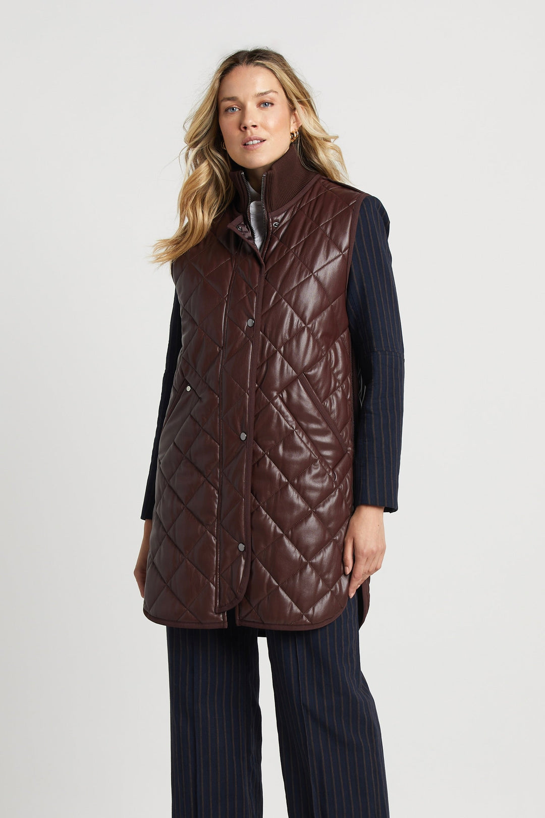 Adroit Atelier Destiny Sleeveless Quilted Vest With Side Zipper Detail in Chocolate available at Barbara Katz