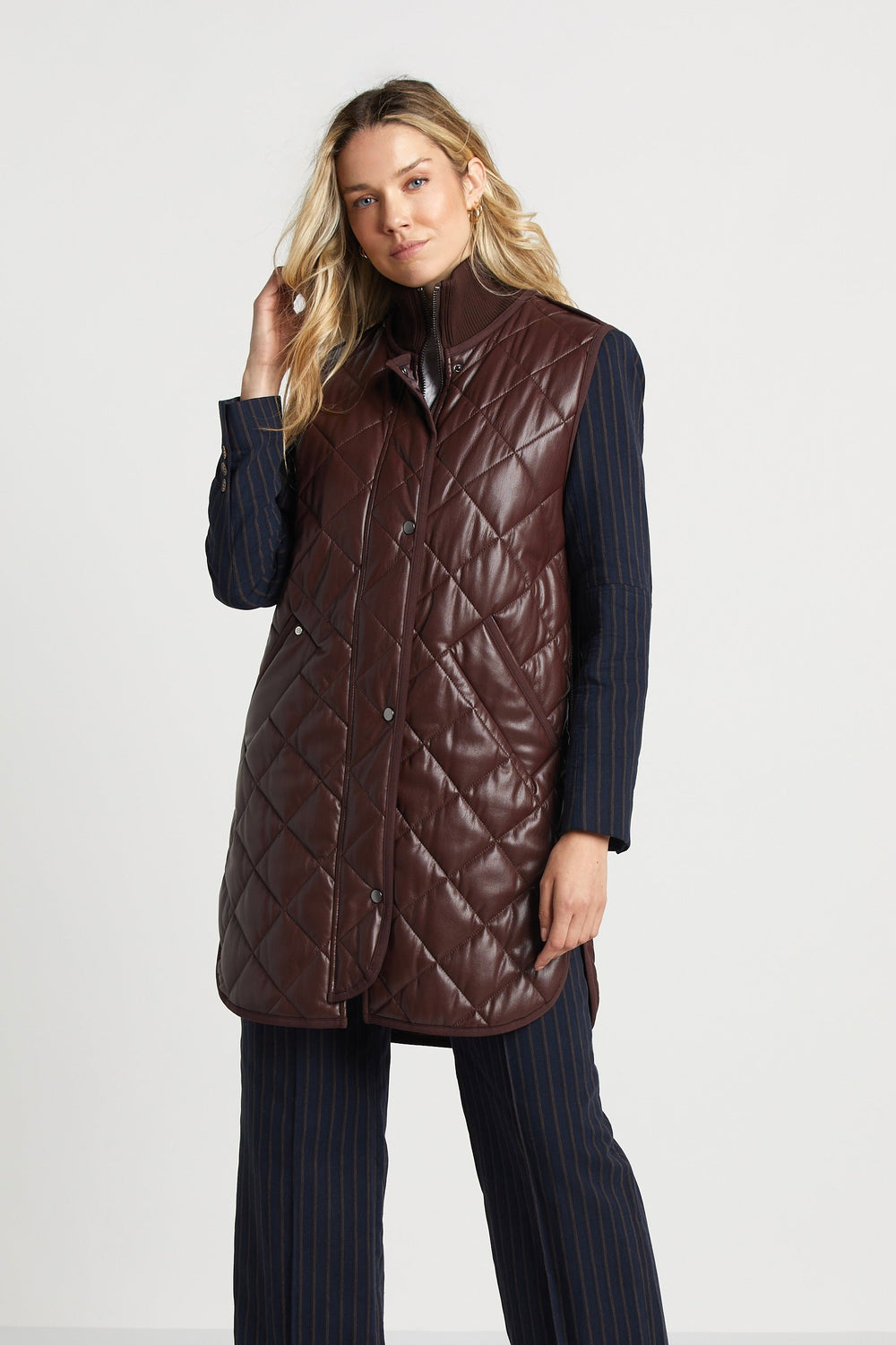 Adroit Atelier Destiny Sleeveless Quilted Vest With Side Zipper Detail in Chocolate available at Barbara Katz