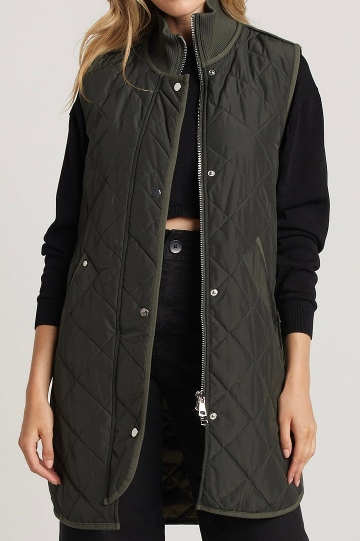 Adroit Atelier Destiny Sleeveless Quilted Vest With Side Zipper Detail in Cilantro available at Barbara Katz