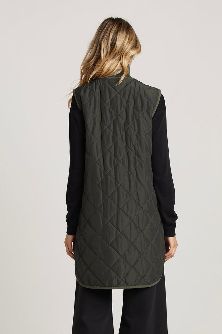 Adroit Atelier Destiny Sleeveless Quilted Vest With Side Zipper Detail in Cilantro available at Barbara Katz