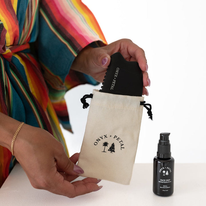 Onyx + Petal Gua Sha Beauty Stone & Petal Face Drip available at Barbara Katz