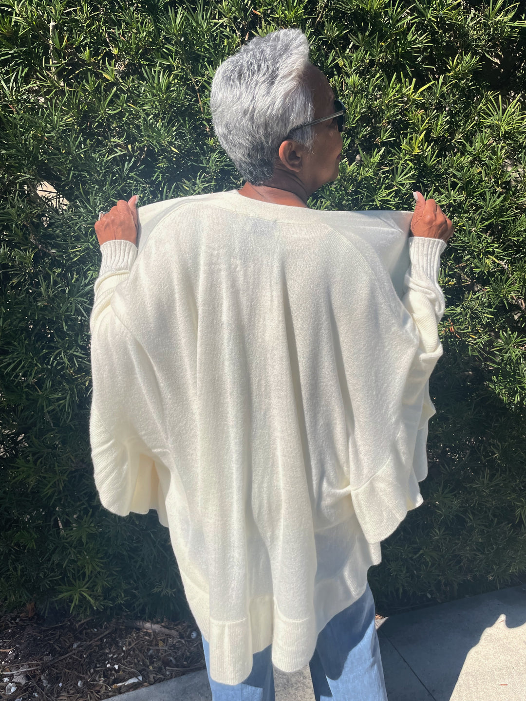 Pure Amici Ruffle Wrap in Salt available at Barbara Katz