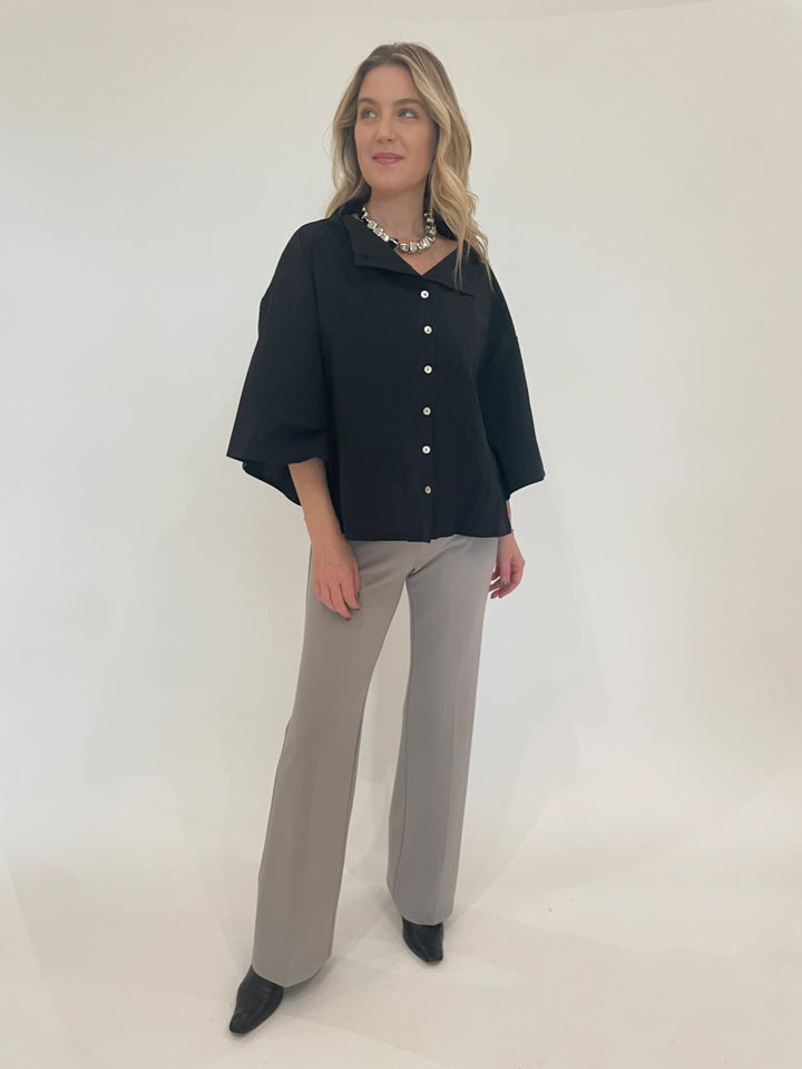 Ozai N Ku Boxy Blouse in Black paired with Peace of Cloth Jules Paramount Knit Pants in Gravel, Vanessa Baroni Small Organic Shaped Necklace in Silver available at Barbara Katz