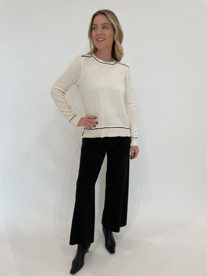 Peace of Cloth Ricrac Detail Crew Neck Sweater in Oyster paired with Lysse Erin High Waist Wide Leg Denim Pants in Black available at Barbara Katz