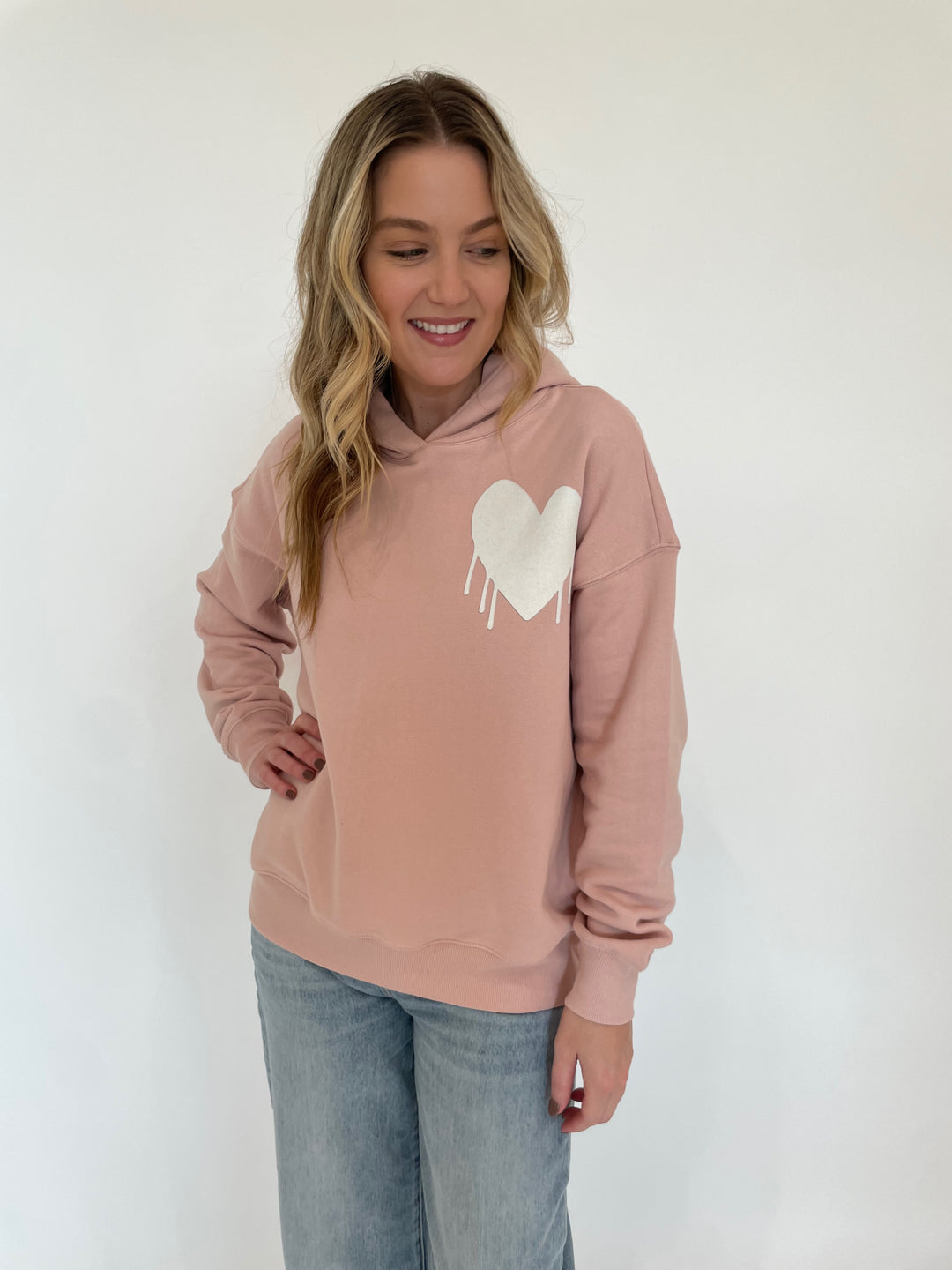 Kerri Rosenthal Boyfriend Drippy Heart Long Sleeve Hoodie in Mauve paired with Pistola Ryder Cuffed Jeans in Essex available at Barbara Katz