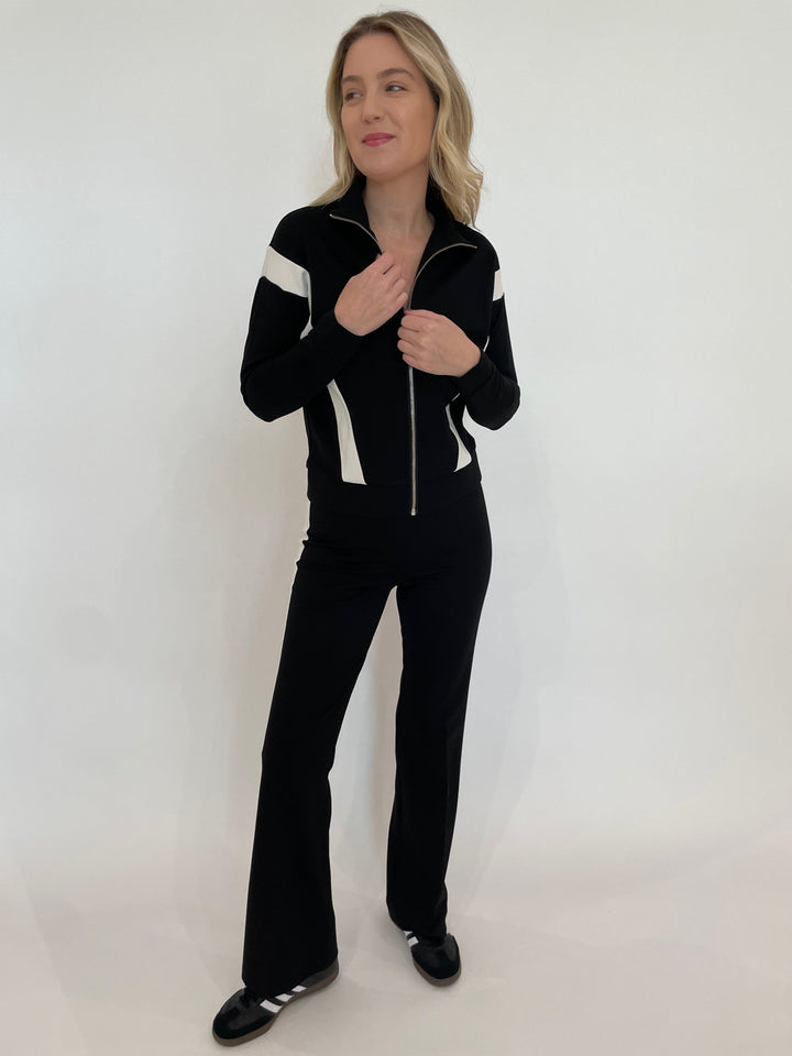 Peace of Cloth Vicki Zip-Up Jacket in Black paired with matching Reese Paramount Knit Pants in Black available at Barbara Katz