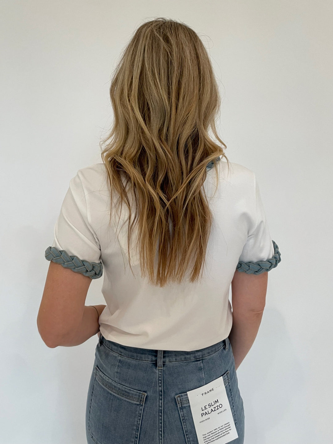 Cinq a Sept Denim Braided T-Shirt in White  paired with Frame Le Slim Palazzo Bardot Pocket Jeans in Wilson Clean available at Barbara Katz