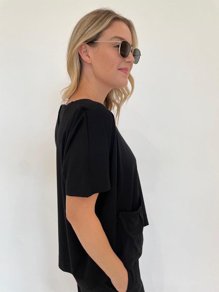 Ozai N Ku Ava V-Neck Short Sleeve Pocket Top in Black available at Barbara Katz