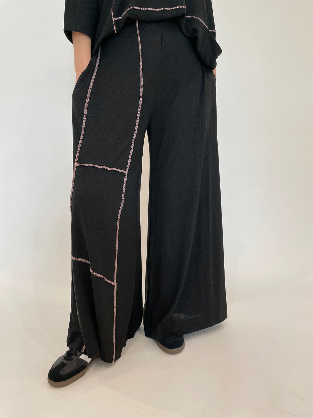 Ozai N Ku Kira Wide Leg Contrast Stitch Pants in Black/Pink available at Barbara Katz