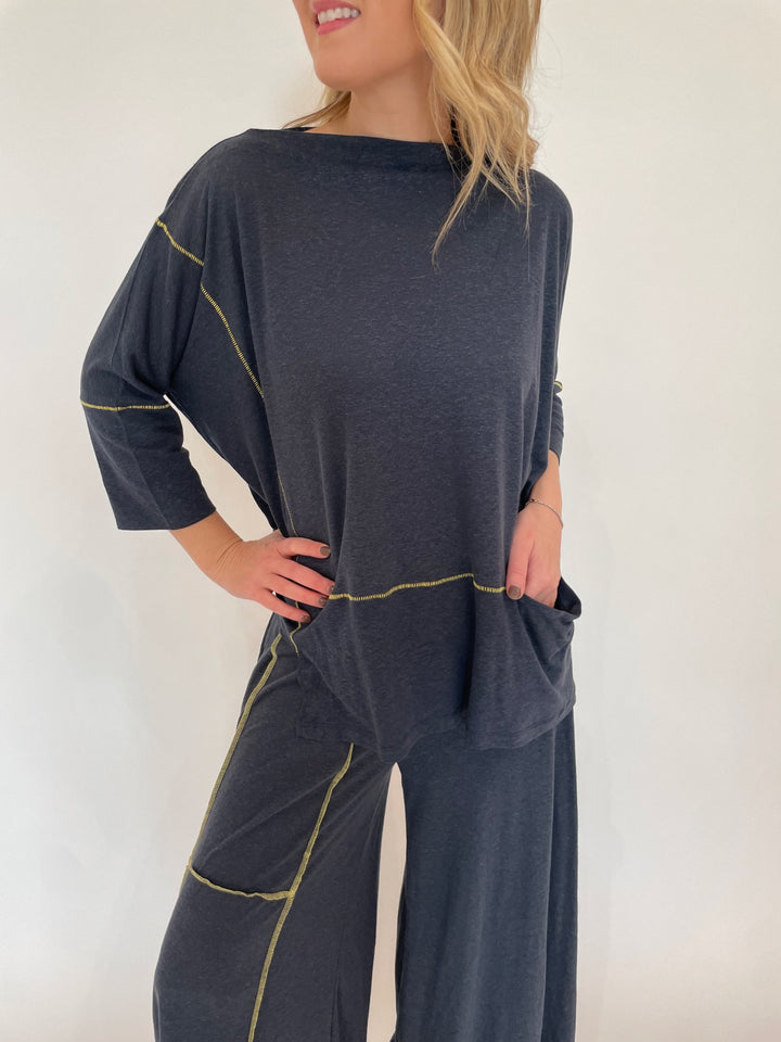 Ozai N Ku Lira 3/4 Sleeve Contrast Stitch Top in Blue/Yellow paired with matching Kira Contrast Stitch Pants available at Barbara Katz