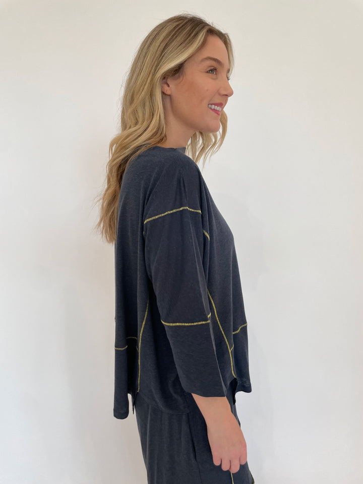 Ozai N Ku Lira 3/4 Sleeve Contrast Stitch Top in Blue/Yellow available at Barbara Katz