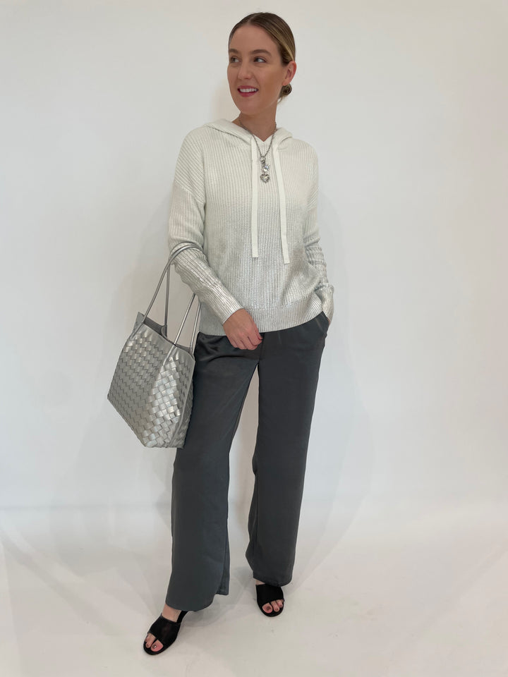 J Society Metallic Ombre Shaker Hoodie in Vanilla paired with J Society Satin Pants in Gunmetal, Elizabeth Cole Jewelry Cerelia Necklace in Silver, , BK Victoria Medium Tote Bag in Silver available at Barbara Katz