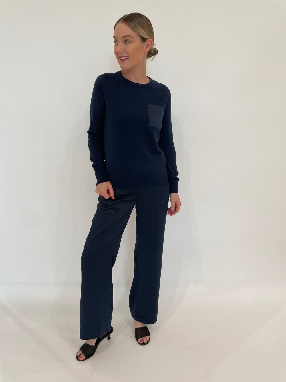 J Society Jesse Satin Pants in Navy paired with matching J Society Jette Satin Pocket Sweatshirt in Navy available at Barbara Katz