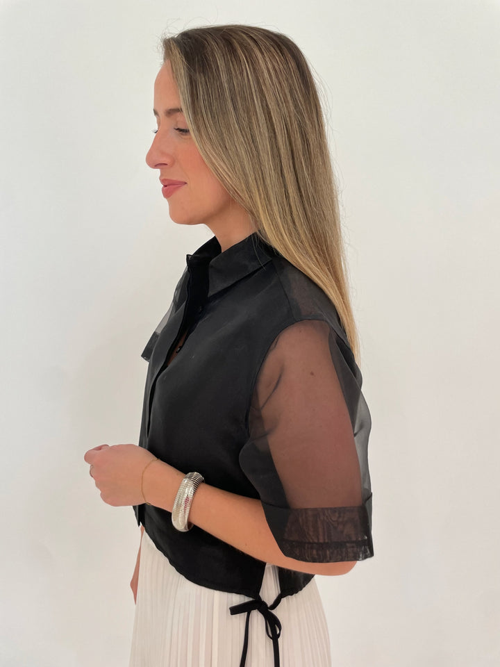 Simkhai Ryett Short Sleeve Crop Shirt in Black paired with Simkhai Valor Midi Skirt in Ivory, BK Silver Cobra Bracelet and July Hammered Wavy Metal Hoop Earrings in Worn Silver - all available at Barbara Katz