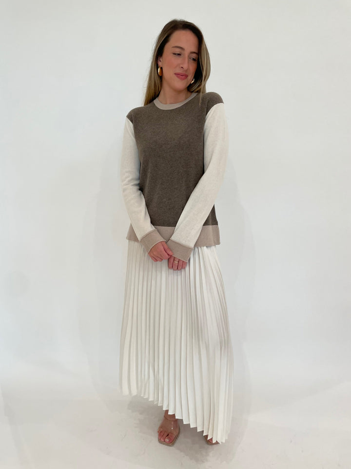 Pure Amici Evermore Cashmere Colorblock Sweater in Bark paired with Simkhai Valor Midi Skirt, and BK Bianca Puffy Triangle Open Hoop Earrings in Gold - all available at Barbara Katz