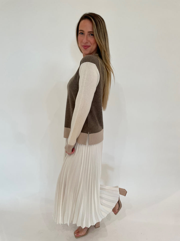 Pure Amici Evermore Cashmere Colorblock Sweater in Bark paired with Simkhai Valor Midi Skirt available at Barbara Katz