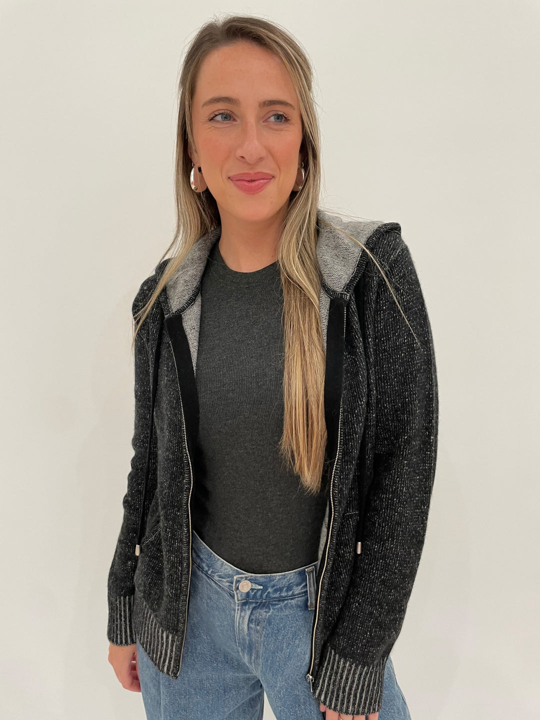 Goldie Ribbed Half Sleeve Tee in Charcoal Heather layered with Pure Amici Folklore Cashmere Full Zip Hoodie in Black, BK Bianca Puffy Triangle Open Hoop Earrings in Silver available at Barbara Katz