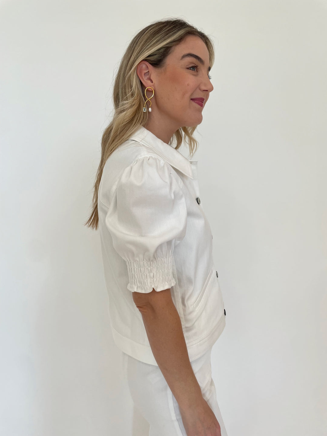 Cinq a Sept Roselyn Short Sleeve Denim Jacket in White with Lizzie Fortunato Etienne Earrings in Gold available at Barbara Katz