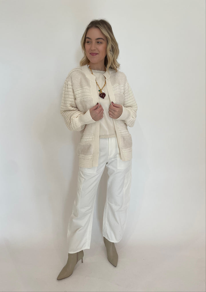 Melissa Nepton Cece Vegan Leather Sleeveless Top in Cream layered with Romeo Fuzzy Crochet Cardigan in Cream, paired with Citizens of Humanity Marcelle Low Slung Easy Cargo Pants in Pashmina, Lizzie Fortunato Murano Heart Necklace available at Barbara Katz