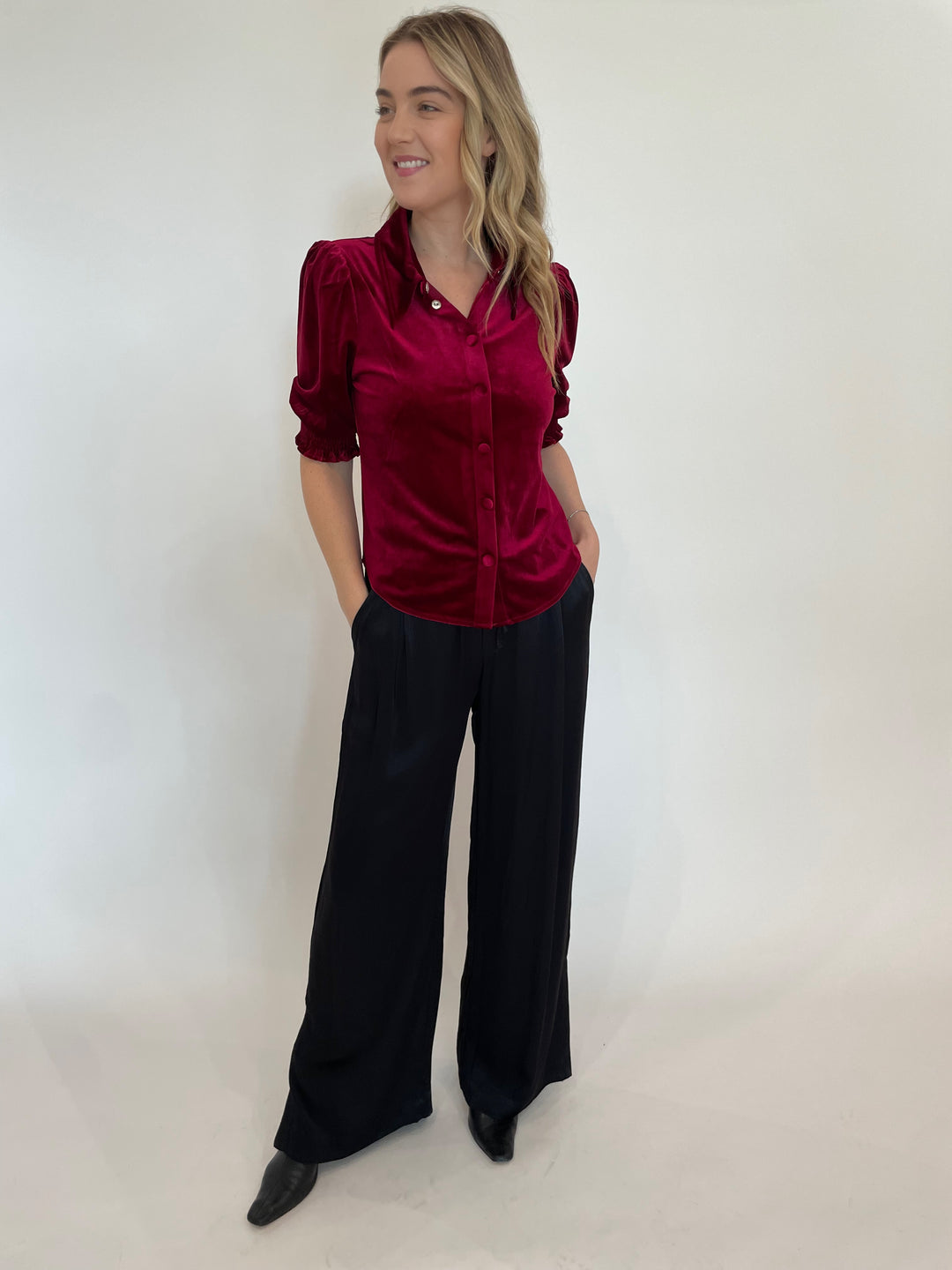 BK Mina Velvet Puff Sleeve Shirt in Deep Red paired with Melissa Nepton Lorene Satin Wide Leg Pants in Black available at Barbara Katz