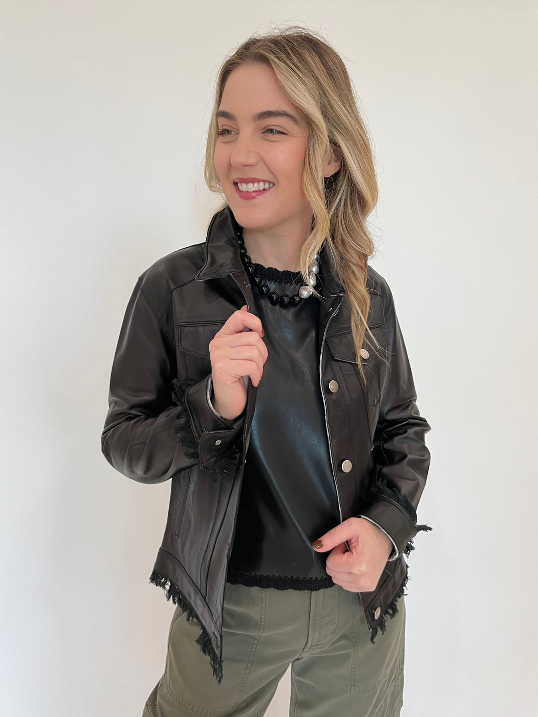 Melissa Nepton Cece Vegan Leather Sleeveless Top in Black layered with Jakett Alexa Patina Leather Jacket in Black, Lizzie Fortunato Midnight Sky Collar Necklace available at Barbara Katz