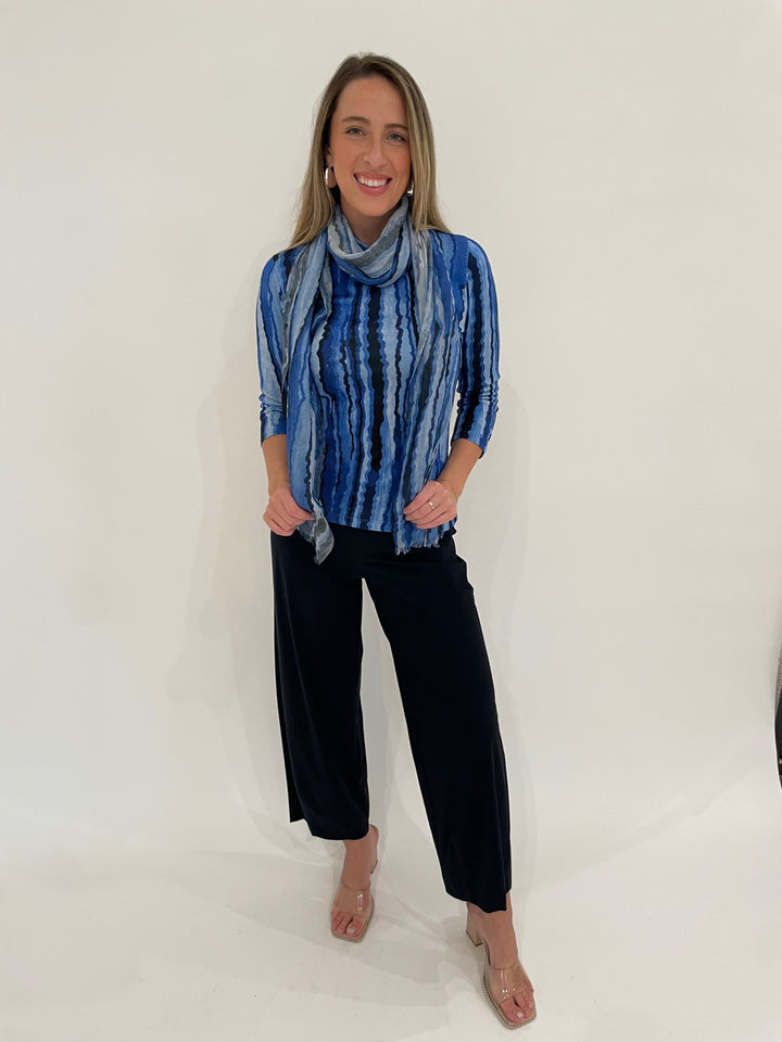 Pashma Contoured Bamboo Silk Lines T-Shirt in Blue with Contoured Lines Scarf, paired with Raffaello Rossi Sally 7/8 High Tech Jersey Pants in Marine, BK Bianca Puffy Earrings in Silver - all available at Barbara Katz