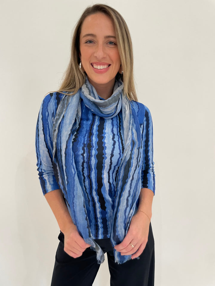 Pashma Contoured Bamboo Silk Lines T-Shirt in Blue with Contoured Lines Scarf, paired with Raffaello Rossi 7/8 Sally Pants in Marine, BK Bianca Puffy Triangle Open Hoop Earrings in Silver - all available at Barbara Katz