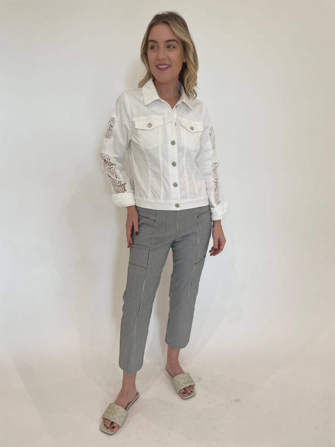 BK Gina Lace Denim Jacket in White paired with Elliott Lauren Moroccan Stripe Crop Cargo Pants in Black/White available at Barbara Katz