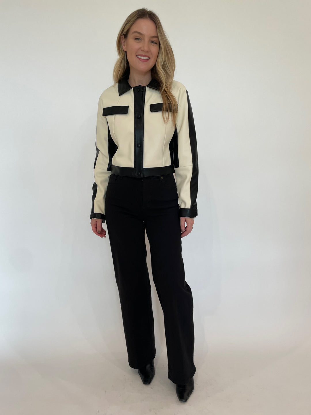 BK Raquel Vegan Leather Crop Jacket in Cream/Black paired with Frame Le Slim Palazzo Wide Leg Jeans in Black available at Barbara Katz