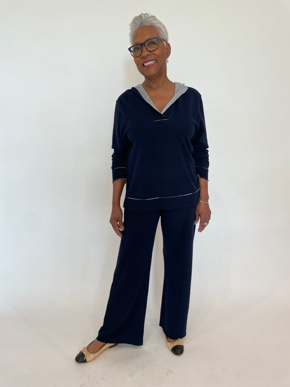 Goldie Stella Double-Faced Hoodie in Navy/Gray Heather paired with matching Stella Flare Pants available at Barbara Katz