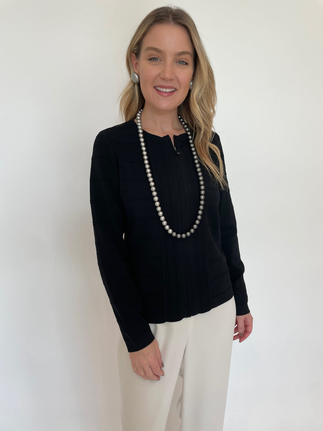 BK Juliet Zip-Front Viscose Knit Jacket in Black paired with Peace of Cloth Jules Paramount Knit Pants in Osyter, Pono Mollie Barile Clip Earrings in Silver and Pono Pauline Necklace in Chrome available at Barbara Katz