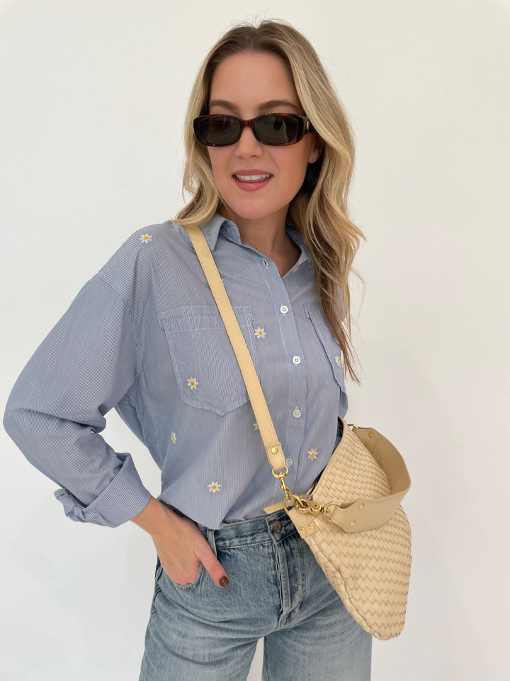 BK Fresh Flower Shirt in Blue Stripe paired with Pistola Ryder High Rise Cuffed Jeans in Essex, Le Specs Unreal! Sunglasses in Toffee Tort, Clare V Moyen Messenger Bag in Cream Woven Checker available at Barbara Katz