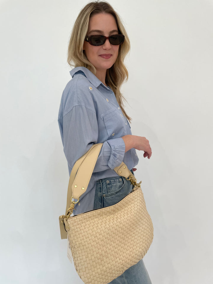 BK Fresh Flower Shirt in Blue Stripe paired with Pistola Ryder High Rise Cuffed Jeans in Essex, Le Specs Unreal! Sunglasses in Toffee Tort, Clare V Moyen Messenger Bag in Cream Woven Checker available at Barbara Katz