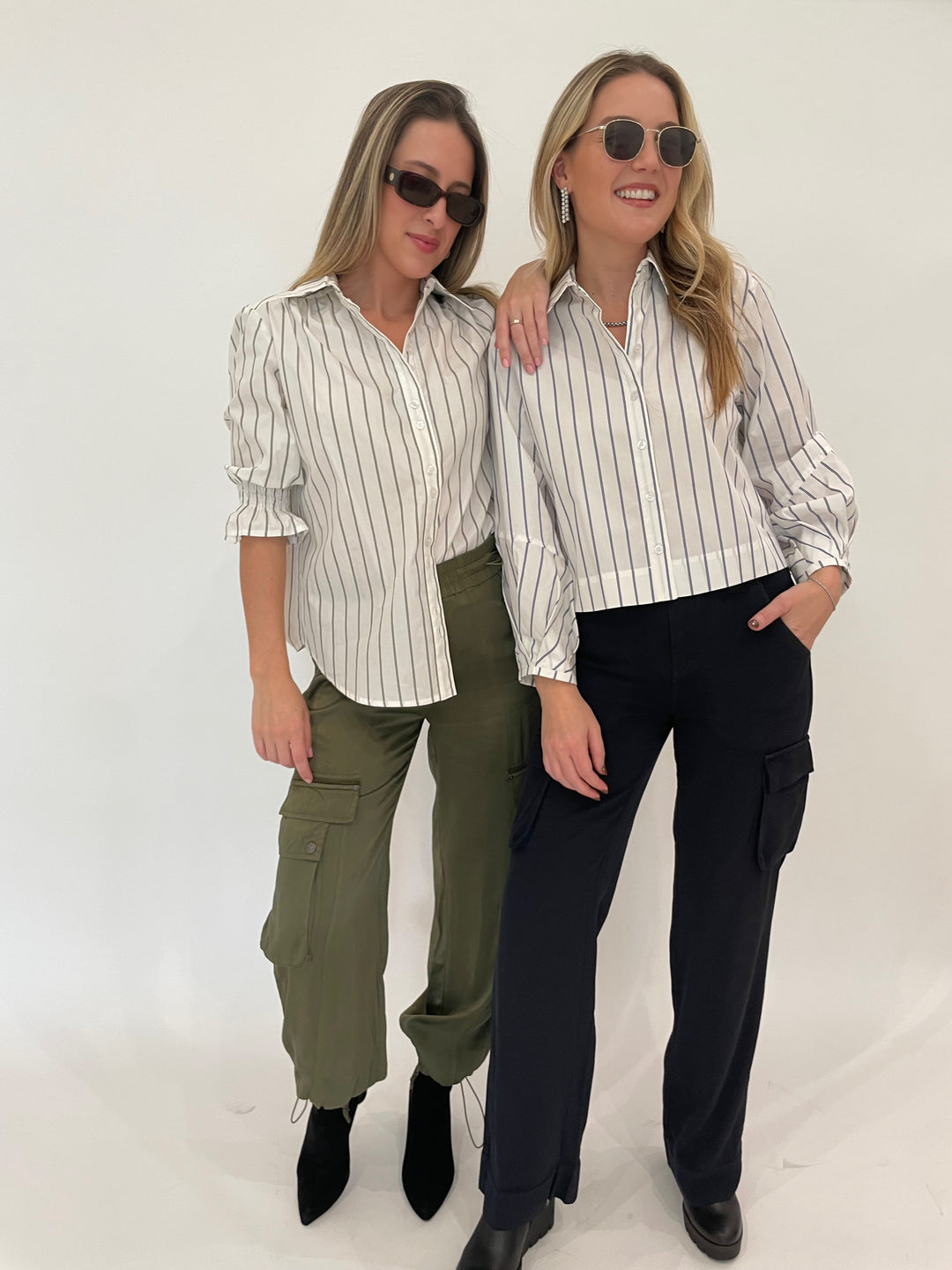 Finley Sirena Double Pinstripe Shirt in White/Green paired with Marrkech Enika Silky Cargo Pants in Pine, Finley Emmy Double Pinstripe Top in White/Blue paired with Marrakech Gavyn Cargo Pants in Black - all available at Barbara Katz