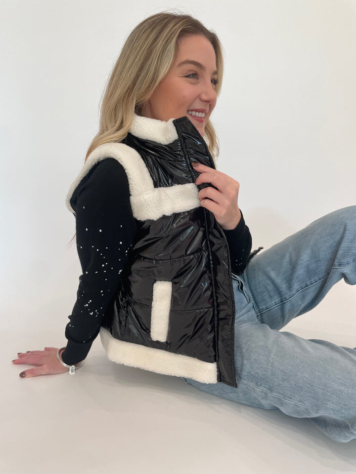 J Society Sherpa Trim Vest in Black with Black Splatter Sweatshirt underneath, paired with Pistola Ryder Cuffed Jeans in Essex, Dean Davidson Silver Crosby Hinged Bangle available at Barbara Katz