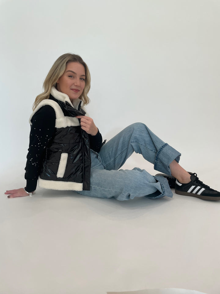 J Society Sherpa Trim Vest in Black with Black Splatter Sweatshirt underneath, paired with Pistola Ryder Cuffed Jeans in Essex, Dean Davidson Crosby Hinged Bangle in Silver available at Barbara Katz