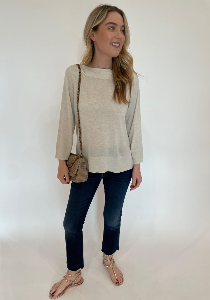 Kinross Hi Low Boatneck Sweater in Whisper paired with Mother The Insider Crop Step Fray Jeans in Off Limits, Noam Hazan Mini Milan Bag in Stone available at Barbara Katz